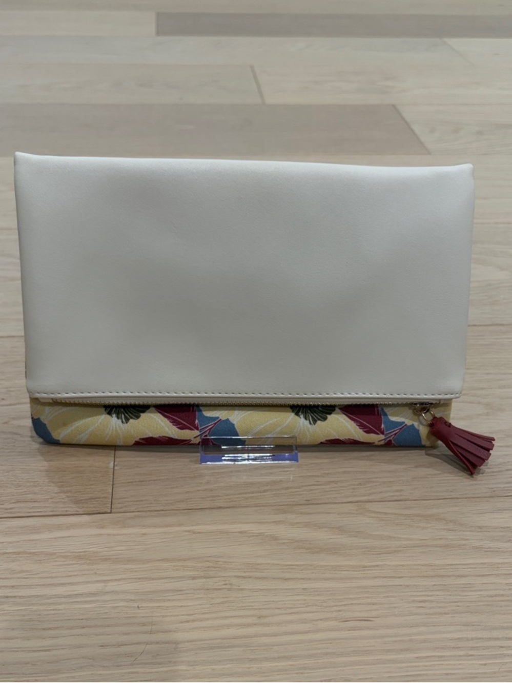 Rachel Pally Cream Fold-Over Clutch with Floral Accent and Pink Tassel